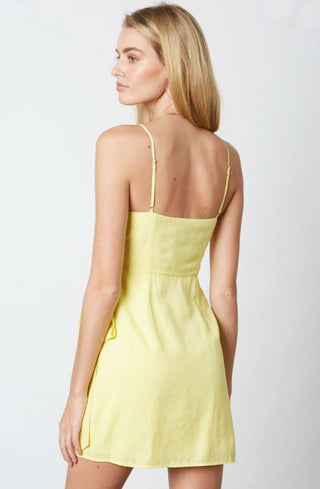 Yellow summer party dress with side tie detail