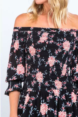 Pink floral off shoulder dress close up