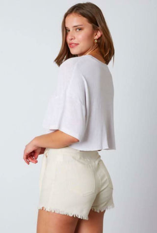 Oversized White Cropped Graphic TeeOversized white crop top side view