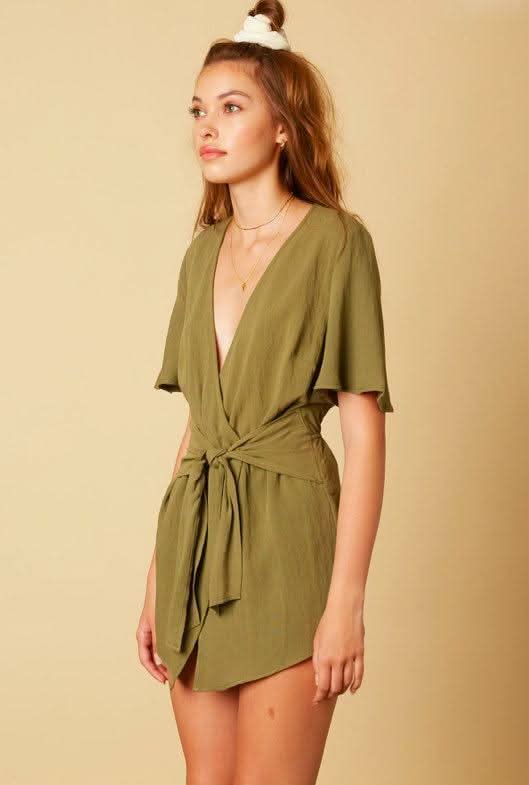 Cotton Candy LA Falling For You Olive Romper - Size M - Plunging Neckline, Flutter Sleeves, Asymmetrical Hem Cotton Candy LA Falling For You Olive Romper - Size M - Plunging Neckline, Flutter Sleeves, Asymmetrical Hem