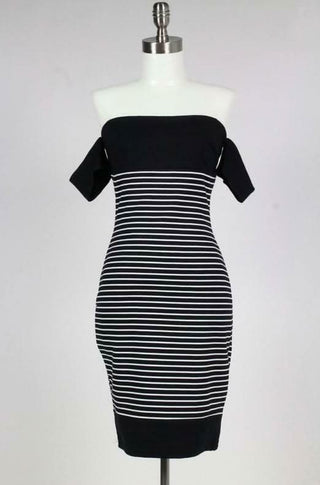 Black & white colorblock striped off-the-shoulder midi dress with Bardot neckline on mannequin | Boho Pink