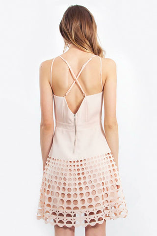 Back view - Spring party outfit: Blush pink laser-cut mini dress styled for a night out