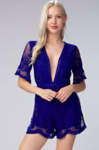 Model wearing the Endless Lace Royal Blue Deep V Romper