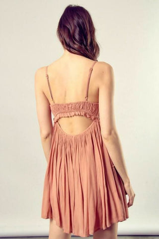 Back view of peanut brown backless dress with ruffle empire waist