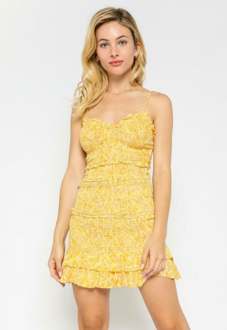 Rhea Yellow Snake Print Smocked Ruffle Mini Dress with V-neckline and tiered ruffle hem