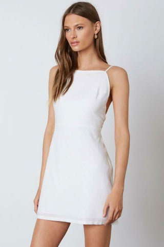 White graduation mini dress side angle view