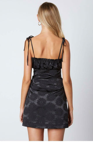Black floral party dress with self tie straps - back view