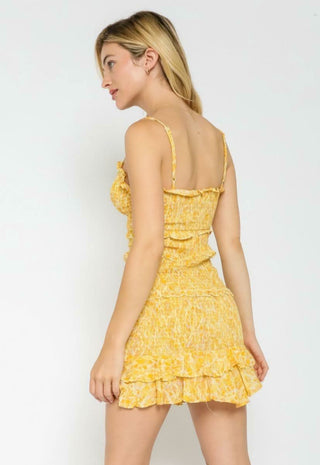 Back view of Rhea Yellow Snake Print Smocked Mini Dress with spaghetti straps