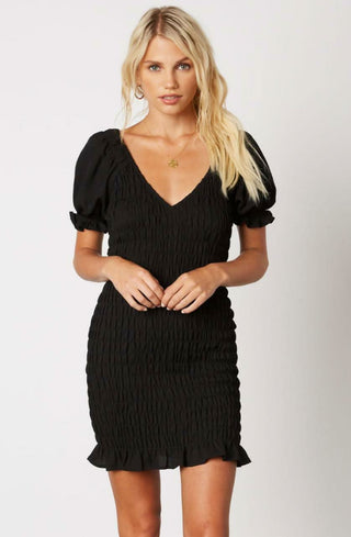 Black smocked puff sleeve mini dress front view