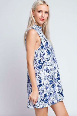 Side view of lightweight woven fabric with blue floral print detail