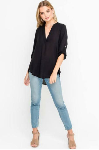 See That Girl Black Roll Tab Sleeve Top styled with jeans and high heel sandals