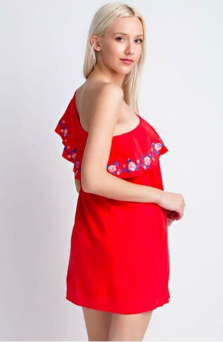 red one-shoulder mini dress showing the ruffle overlay and relaxed shift silhouette