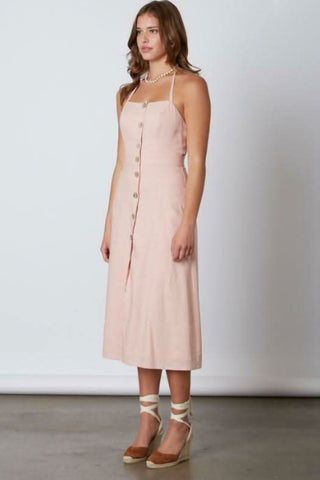 Blush pink button front midi dress front angle view