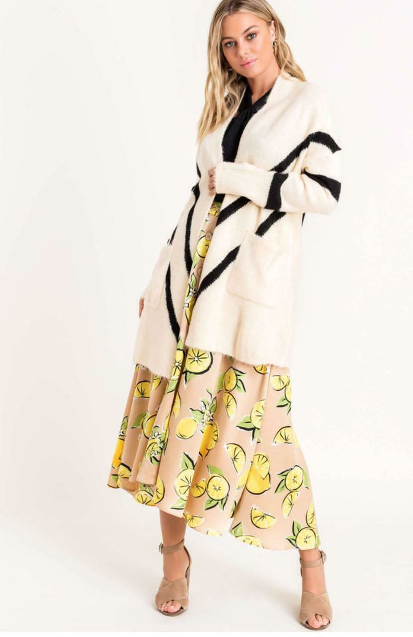 Cozy Dreams Cream Chevron Striped Knit Cardigan styled as an oversized cardigan