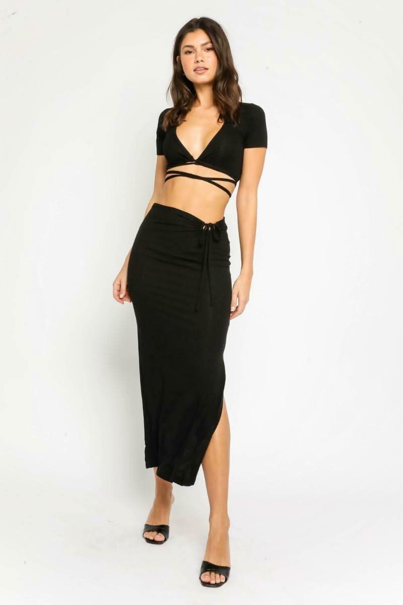 Olivaceous Style Iconic Black Two-Piece Midi Dress - Ribbed Knit Crop Top and Midi Skirt Set Olivaceous Style Iconic Black Two-Piece Midi Dress - Ribbed Knit Crop Top and Midi Skirt Set