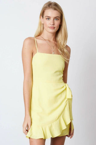 Lemon yellow ruffle wrap mini dress front view