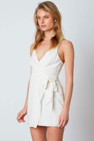 White faux wrap mini dress with cami straps