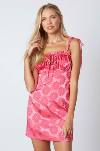 Fuchsia satin homecoming dress with tonal floral print