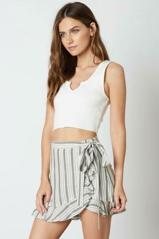 Black and white ruffle skort styled with crop top