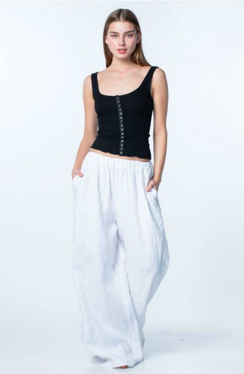 Set Me Free Solid Rib Black Cropped Tank Top styled with white pants