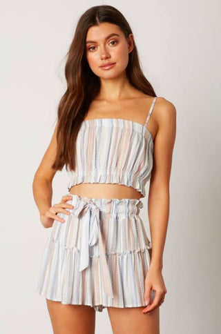 Blue striped summer outfit for beach vacations