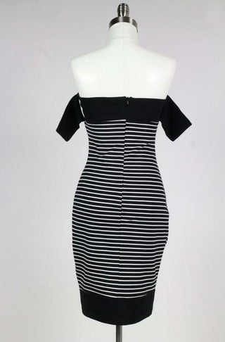 Back view of soft stretch knit fabric and bold colorblock stripes on a midi-length bodycon dress | Boho Pink