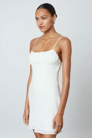 White ruched mini dress for bridal events