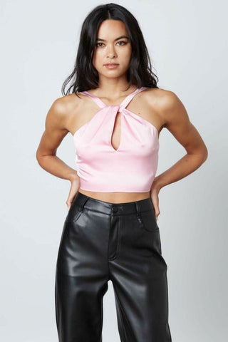 Pink satin halter crop top with keyhole neckline and cropped fit
