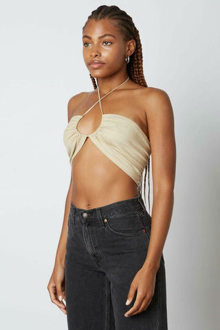 Side profile of a jute bandeau-style halter top with adjustable neck ties