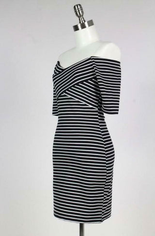 Black & white striped bodycon dress featuring a crisscross wrap bodice & off-shoulder neckline | Boho Pink