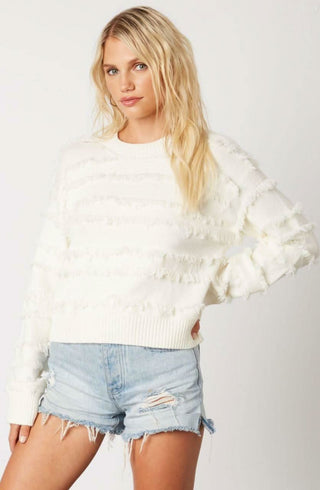 Hailey Ivory Fringe Sweater styled with jean shorts