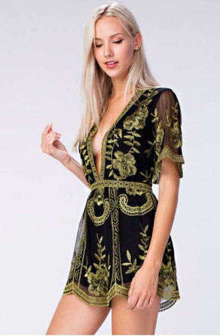 Side view of Endless Lace Black and Gold Deep V Romper with plunce neckline