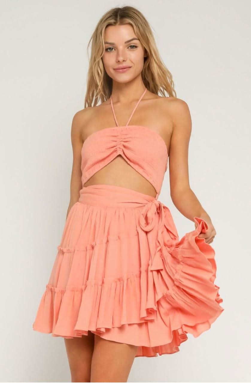 Olivaceous Mambo Peach Sunset Cutout Ruffle Dress - Size S - Rayon Fabric - Smocked Bust - String Halter Neckline - Cutout Waist - Tiered Ruffle Wrap Olivaceous Mambo Peach Sunset Cutout Ruffle Dress - Size S - Rayon Fabric - Smocked Bust - String Halter Neckline - Cutout Waist - Tiered Ruffle Wrap