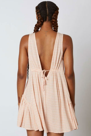 Women’s peach swing dress for beach vacations
