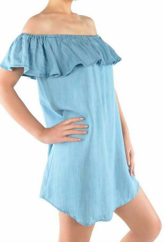 Close-up of the soft 100% Lyocell chambray fabric and ruffle overlay detail.