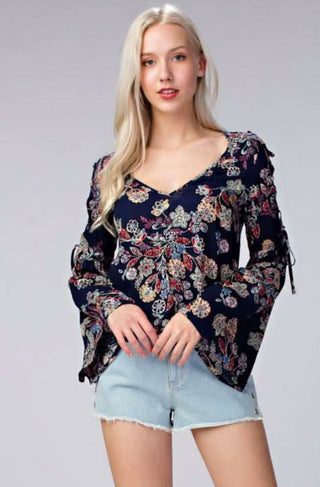 navy floral cold shoulder bell sleeve top front view