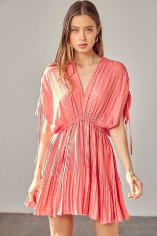 Milky pink dolman sleeve mini dress with pleated skirt and V-neckline