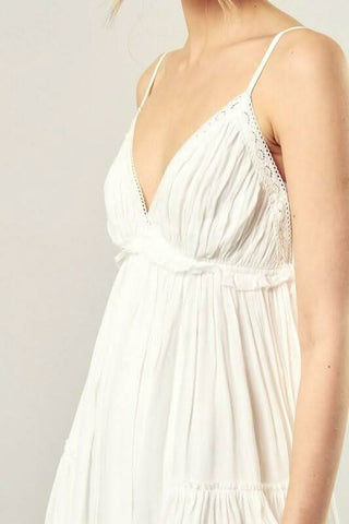 Flowy white mini dress for graduation