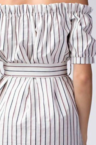 close-up of beige striped off the shoulder shirt dress