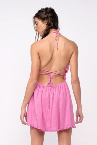 Back view of Kristen Pink Halter Mini Dress with strappy open back and ties
