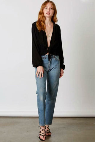 black plunge neck long sleeve top