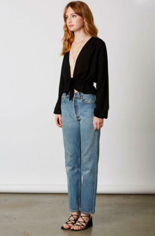 black plunge neckline long sleeve top front view