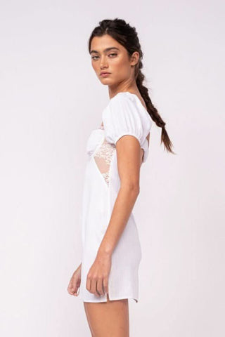Delilah White Puff Sleeve Bustier Mini Dress side view | Boho Pink