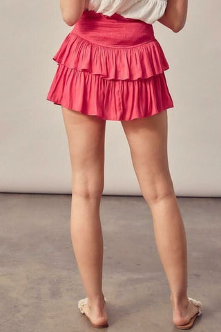 Hot pink ruffle skort outfit idea for summer vacation or night out - back view
