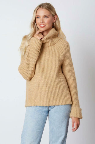 Jane Tan Chunky Turtleneck Sweater styled with jeans